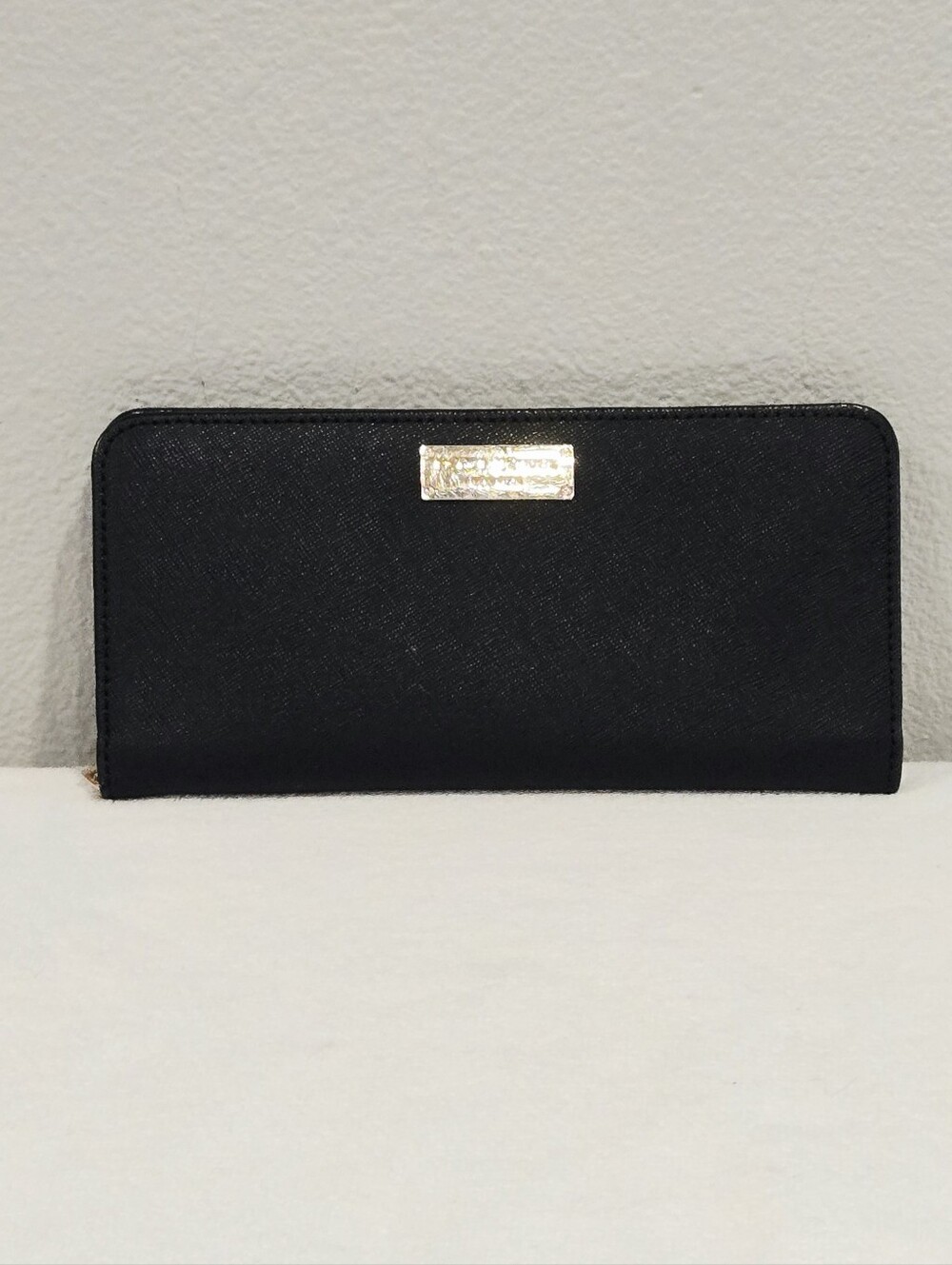 henri bendel Black Saffiano Bi-fold Zip Wallet With Purple Interior